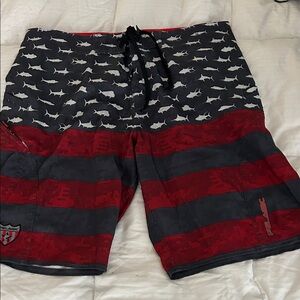 Pelagic Men's Shark Patterned Red and Black Board Shorts